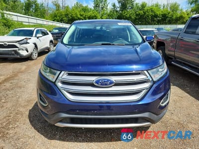 Piąte zdjęcie samochodu w środku: 2016 FORD EDGE SEL VIN:2FMPK4J82GBC10477 - miniatura