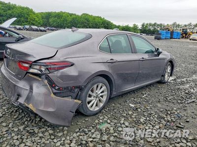 Trzecie zdjęcie samochodu z tyłu: 2022 TOYOTA CAMRY XLE AUTOMATIC VIN:4T1C11AK6NU633808 - miniatura