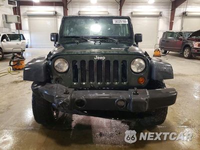 Piąte zdjęcie samochodu w środku: 2011 JEEP WRANGLER RUBICON VIN:1J4BA6D10BL560110 - miniatura