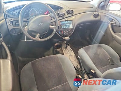 Zdjęcie 8 z 13 samochodu: 2000 FORD FOCUS LX VIN:1FAFP33P1YW346931 - miniatura