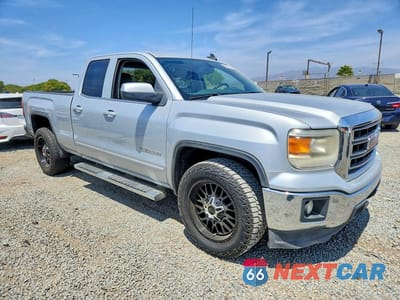 Czwarte zdjęcie samochodu z boku: 2015 GMC SIERRA C1500 SLE VIN:1GTR1UEC4FZ171434 - miniatura