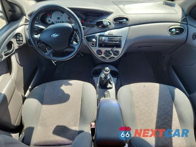 Zdjęcie 8 z 12 samochodu: 2003 FORD FOCUS ZX5 VIN:3FAHP37323R133658 - miniatura