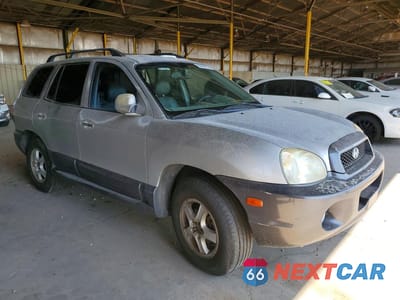 Czwarte zdjęcie samochodu z boku: 2003 HYUNDAI SANTA FE GLS VIN:KM8SC13D63U433531 - miniatura