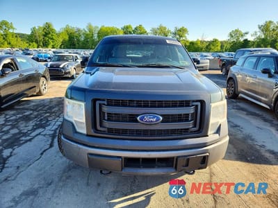 Piąte zdjęcie samochodu w środku: 2014 FORD F150 SUPERCREW VIN:1FTFW1ET6EKG11048 - miniatura