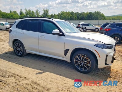 Czwarte zdjęcie samochodu z boku: 2026 BMW X5 XDRIVE50E VIN:5UX43EU02T9129016 - miniatura