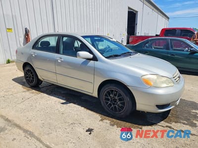 Czwarte zdjęcie samochodu z boku: 2003 TOYOTA COROLLA LE VIN:2T1BR32E93C023490 - miniatura