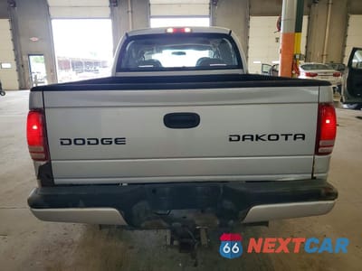 Zdjęcie 6 z 13 samochodu: 2004 DODGE DAKOTA QUAD SPORT VIN:1D7HG38N54S520064 - miniatura