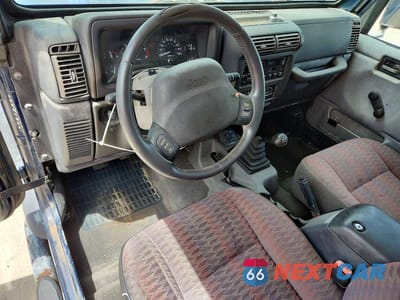 Zdjęcie 8 z 12 samochodu: 2000 JEEP WRANGLER / TJ SE VIN:1J4FA29P2YP771267 - miniatura