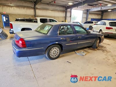 Trzecie zdjęcie samochodu z tyłu: 2004 MERCURY GRAND MARQUIS GS VIN:2MEFM74W04X605101 - miniatura