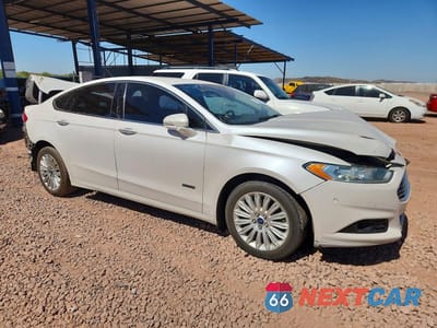 Czwarte zdjęcie samochodu z boku: 2014 FORD FUSION TITANIUM PHEV VIN:3FA6P0SU6ER150696 - miniatura