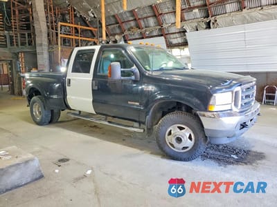 Czwarte zdjęcie samochodu z boku: 2003 FORD F350 SUPER DUTY VIN:1FTWW33P63EC12458 - miniatura