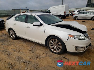 Czwarte zdjęcie samochodu z boku: 2011 LINCOLN MKS VIN:1LNHL9FT5BG614645 - miniatura