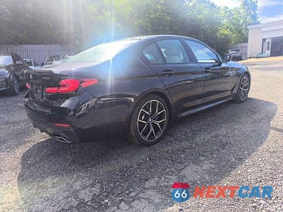 Czwarte zdjęcie samochodu z boku: 2023 BMW 540 XI VIN:WBA73BJ04PWY15063 - miniatura