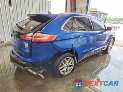 Trzecie zdjęcie samochodu z tyłu: 2022 FORD EDGE SEL VIN:2FMPK4J93NBA20094 - miniatura