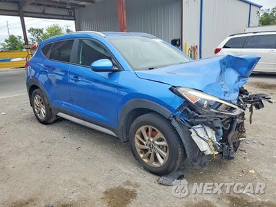Czwarte zdjęcie samochodu z boku: 2017 HYUNDAI TUCSON SE VIN:KM8J33A41HU567588 - miniatura