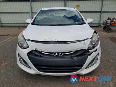 Piąte zdjęcie samochodu w środku: 2013 HYUNDAI ELANTRA GT BASE VIN:KMHD35LE4DU129625 - miniatura
