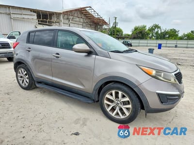 Czwarte zdjęcie samochodu z boku: 2015 KIA SPORTAGE LX VIN:KNDPB3AC8F7671290 - miniatura