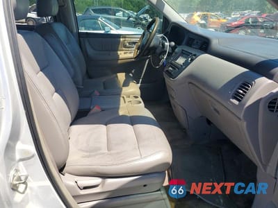 Zdjęcie 11 z 13 samochodu: 2003 HONDA ODYSSEY EXL VIN:5FNRL187X3B062422 - miniatura