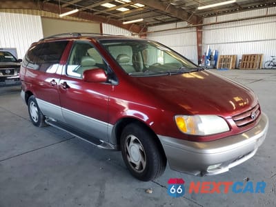 Czwarte zdjęcie samochodu z boku: 2002 TOYOTA SIENNA XLE VIN:4T3ZF13C52U455040 - miniatura