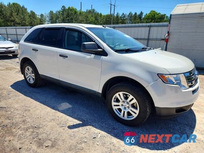 Czwarte zdjęcie samochodu z boku: 2010 FORD EDGE SE VIN:2FMDK3GC5ABB50677 - miniatura