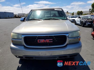 Piąte zdjęcie samochodu w środku: 1999 GMC NEW SIERRA K1500 VIN:2GTEK19T2X1534943 - miniatura