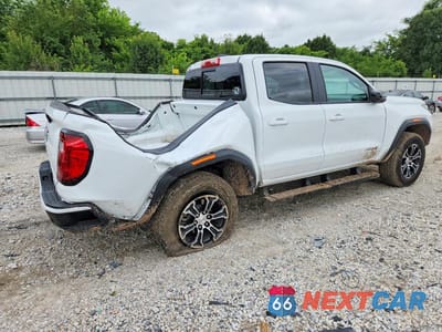 Trzecie zdjęcie samochodu z tyłu: 2023 GMC CANYON AT4 VIN:1GTP6DEK5P1255892 - miniatura