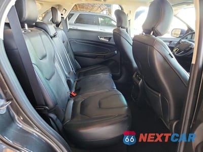 Zdjęcie 11 z 13 samochodu: 2019 FORD EDGE TITANIUM VIN:2FMPK3K92KBB81198 - miniatura