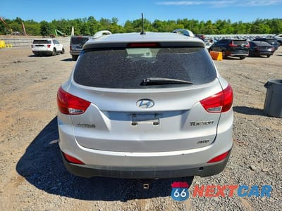 Zdjęcie 6 z 13 samochodu: 2011 HYUNDAI TUCSON GLS VIN:KM8JUCAC4BU300151 - miniatura