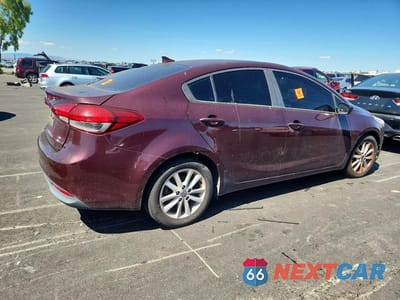 Trzecie zdjęcie samochodu z tyłu: 2017 KIA FORTE LX VIN:3KPFL4A75HE147003 - miniatura