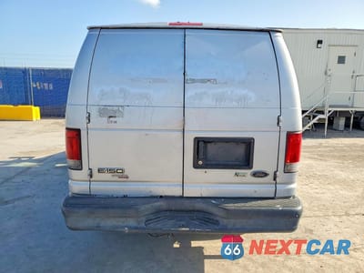 Zdjęcie 6 z 13 samochodu: 2014 FORD ECONOLINE E150 VAN VIN:1FTNE1EW8EDB05699 - miniatura