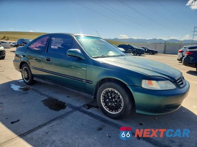 Czwarte zdjęcie samochodu z boku: 1999 HONDA CIVIC EX VIN:1HGEJ8241XL004554 - miniatura