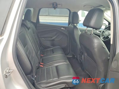 Zdjęcie 10 z 12 samochodu: 2017 FORD ESCAPE TITANIUM VIN:1FMCU9J90HUA51307 - miniatura
