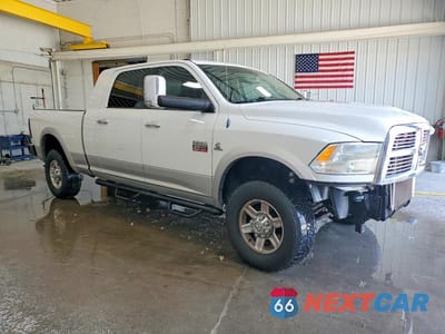 Czwarte zdjęcie samochodu z boku: 2012 DODGE RAM 2500 LARAMIE VIN:3C6UD5NL4CG199518 - miniatura