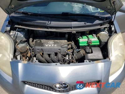 Zdjęcie 11 z 12 samochodu: 2009 TOYOTA YARIS BASE VIN:JTDKT903495248878 - miniatura