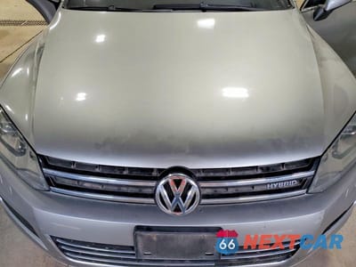 Zdjęcie 12 z 14 samochodu: 2011 VOLKSWAGEN TOUAREG HYBRID VIN:WVGFG9BP1BD004991 - miniatura