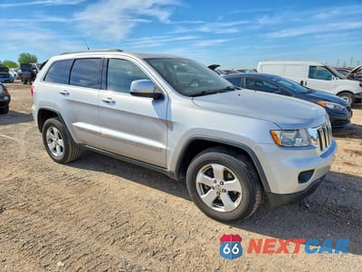 Czwarte zdjęcie samochodu z boku: 2011 JEEP GRAND CHEROKEE LAREDO VIN:1J4RR4GG0BC508052 - miniatura
