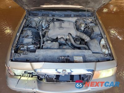 Zdjęcie 11 z 12 samochodu: 2002 MERCURY GRAND MARQUIS GS VIN:2MEFM74W02X664503 - miniatura