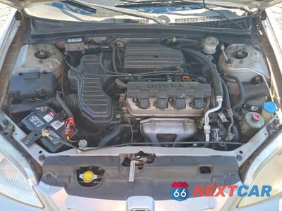 Zdjęcie 11 z 12 samochodu: 2001 HONDA CIVIC LX VIN:1HGEM22551L007252 - miniatura