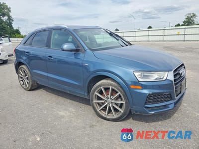 Czwarte zdjęcie samochodu z boku: 2018 AUDI Q3 PREMIUM VIN:WA1ECCFS3JR025411 - miniatura