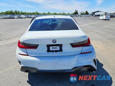 Zdjęcie 6 z 12 samochodu: 2019 BMW 330I VIN:WBA5R1C54KAK06621 - miniatura