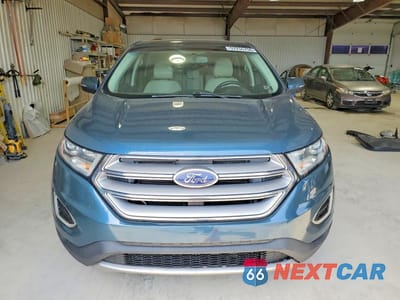 Piąte zdjęcie samochodu w środku: 2016 FORD EDGE TITANIUM VIN:2FMPK4K97GBC49072 - miniatura