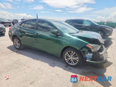 Czwarte zdjęcie samochodu z boku: 2014 TOYOTA COROLLA LE PLUS VIN:5YFBURHE3EP009533 - miniatura