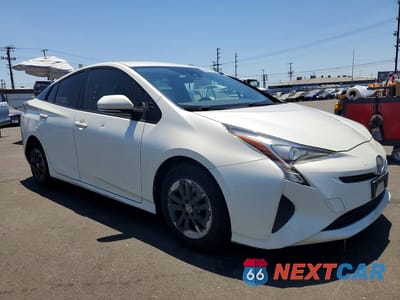 Czwarte zdjęcie samochodu z boku: 2017 TOYOTA PRIUS TWO VIN:JTDKBRFUXH3553945 - miniatura