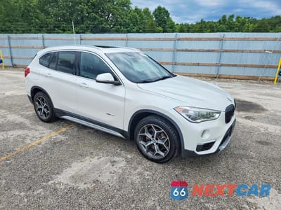 Czwarte zdjęcie samochodu z boku: 2017 BMW X1 XDRIVE28I VIN:WBXHT3C32H5F78977 - miniatura