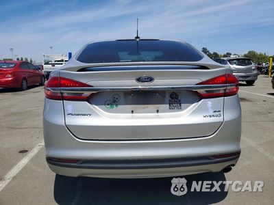 Zdjęcie 6 z 12 samochodu: 2018 FORD FUSION SE HYBRID VIN:3FA6P0LU6JR103239 - miniatura