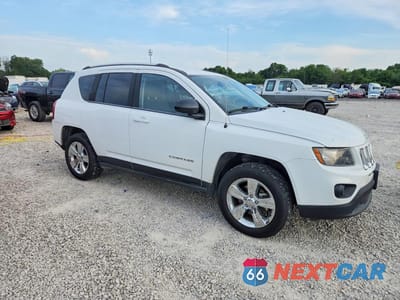 Czwarte zdjęcie samochodu z boku: 2014 JEEP COMPASS SPORT VIN:1C4NJDBB3ED879552 - miniatura