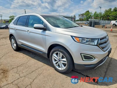 Czwarte zdjęcie samochodu z boku: 2017 FORD EDGE SEL VIN:2FMPK4J87HBB98151 - miniatura
