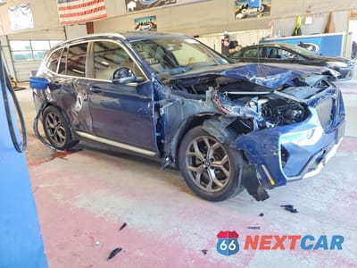 Czwarte zdjęcie samochodu z boku: 2022 BMW X3 XDRIVE30I VIN:5UX53DP05N9M40050 - miniatura
