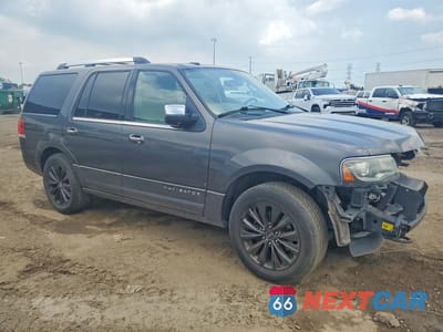 Czwarte zdjęcie samochodu z boku: 2015 LINCOLN NAVIGATOR VIN:5LMJJ2HT2FEJ04117 - miniatura