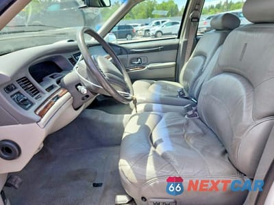 Zdjęcie 7 z 13 samochodu: 1997 LINCOLN TOWN CAR SIGNATURE VIN:1LNLM82W1VY742557 - miniatura